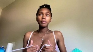 Cute young Ebony pumps her titty milk for Youtube