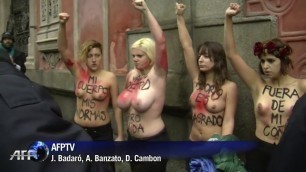 Topless FEMEN activists invade anti abortion demo in Madrid