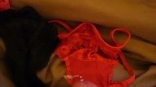 cumming on a red lace thong