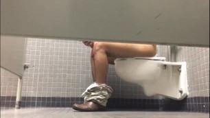Guy on his lunch break taking a leisurely dump at the mall
