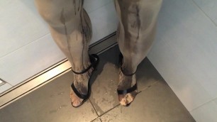 Pissing in shiny pantyhose an high heels sandals